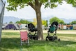 (Rick Egan | The Salt Lake Tribune) Abandoned strollers with backpacks and clothing remain at Centennial Park on Monday, June 16, 2025, after a shooting that happened Sunday at WestFest in West Valley City.